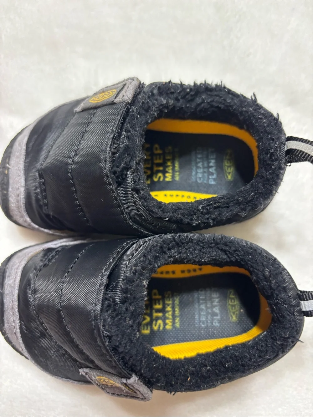 Keen Black and Gray Kids Slip-On Shoes with Yellow Logo